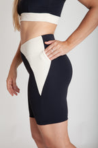 NBB23 - Bermuda Fitness Bolso Lateral Esquerda Bicolor