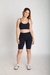 Top fitness feminino preto em Nagoya para treino vista frontal